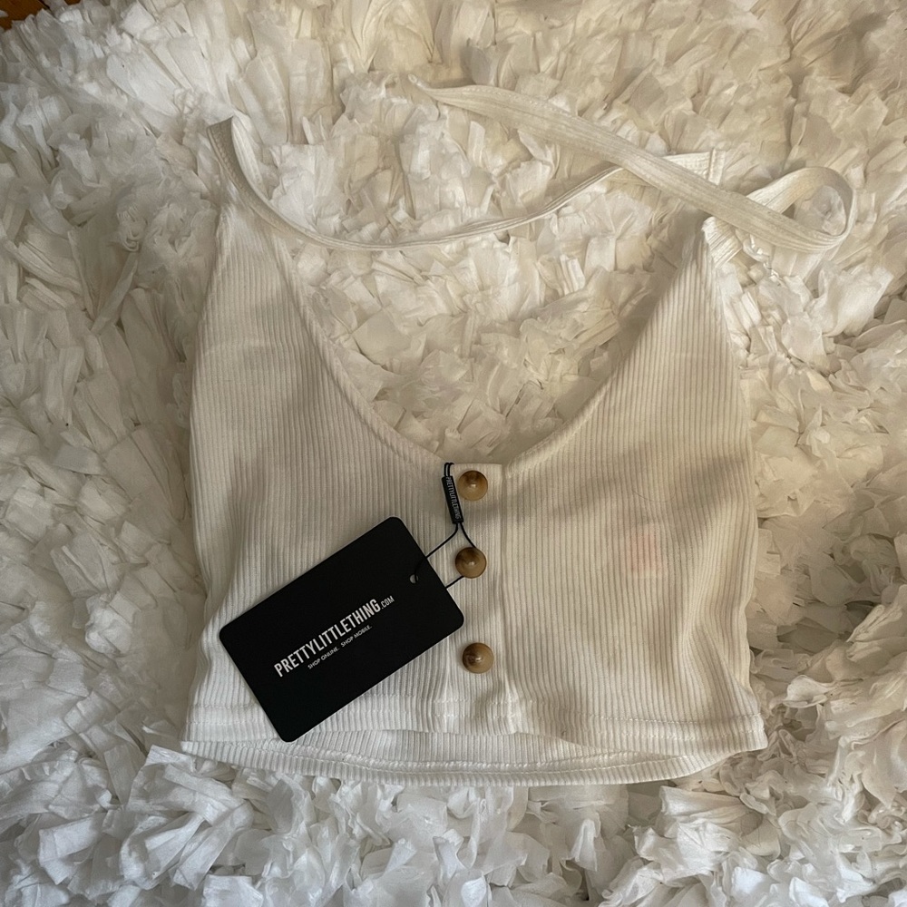 PrettyLittleThing Cream colored ribbed halter top.